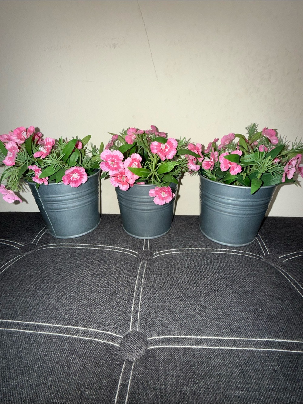 3 pink faux flower pants in tin buckets